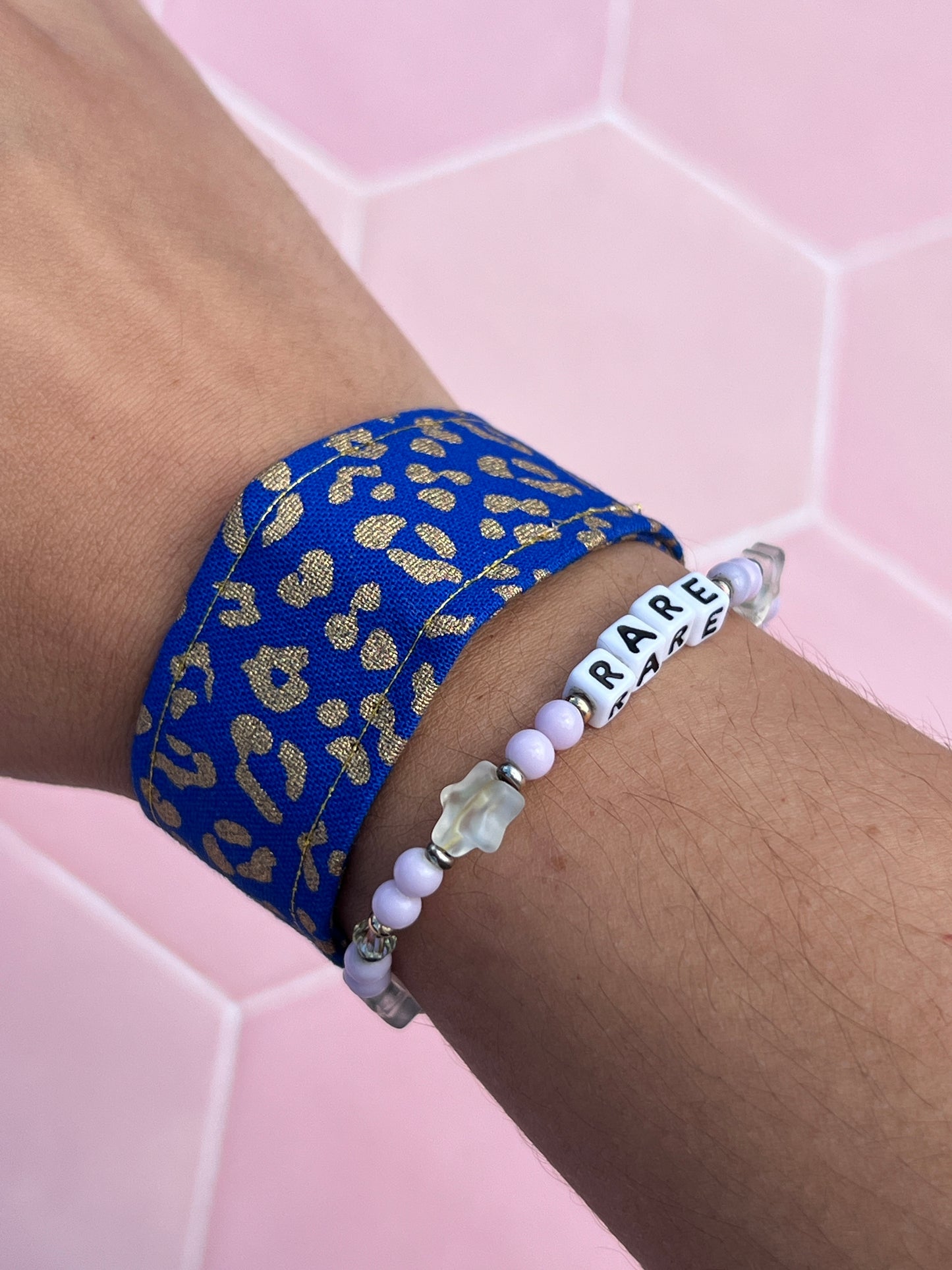 Blue and Gold Leopard Print Wristlet Keychain on wrist