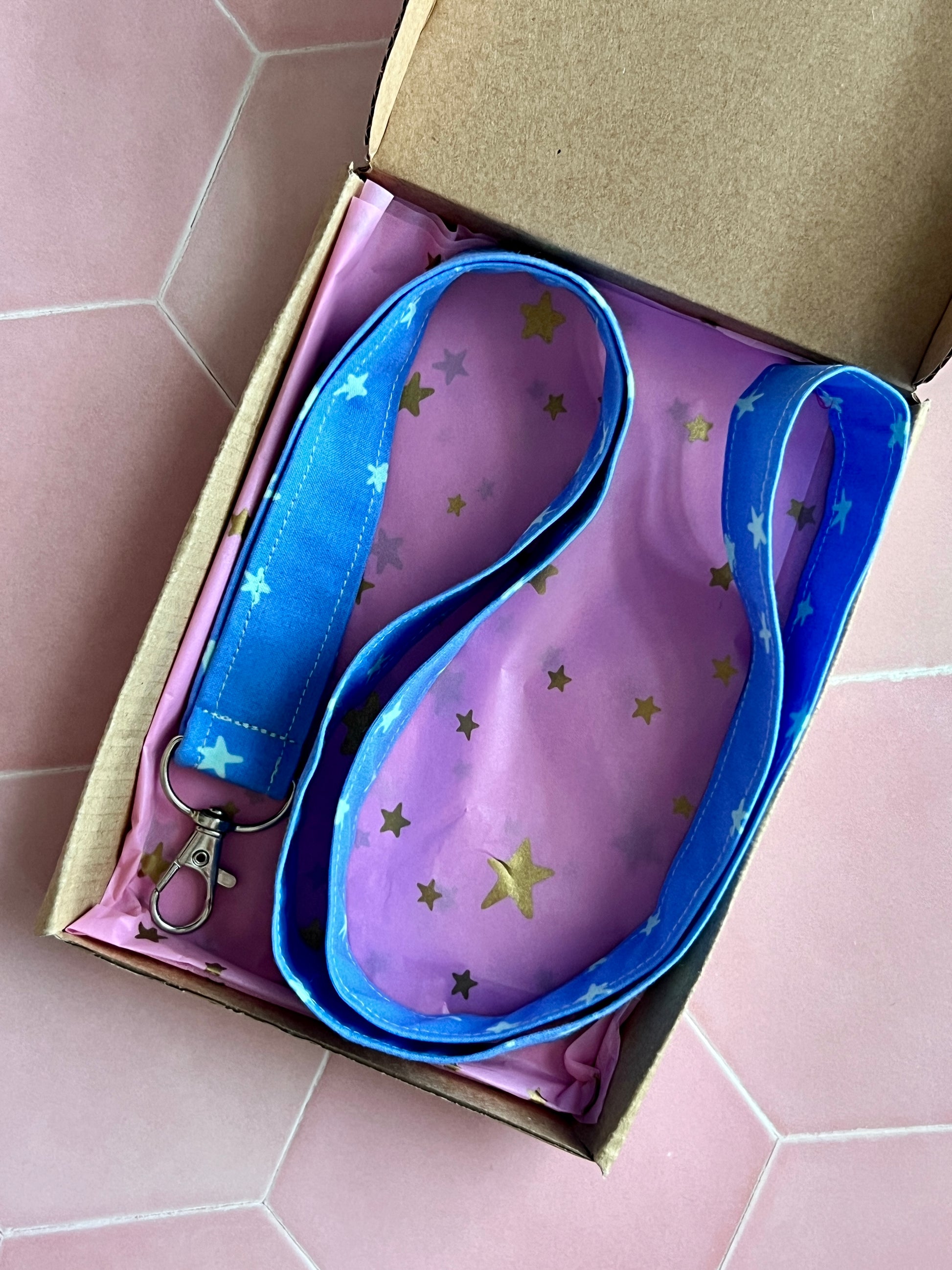 Gift-wrapped handmade blue and mint star lanyard with D-ring, ideal for teachers, students, and busy professionals