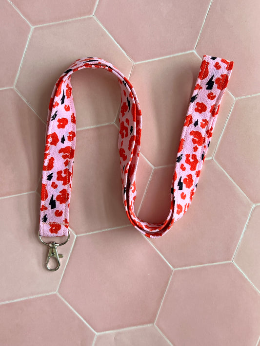 Handmade pink and red leopard print fabric lanyard with D-ring, ideal for keys and ID badges, small business accessories UK