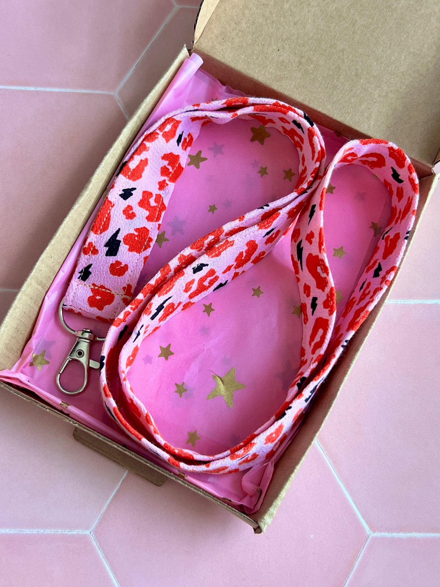Pink and red handmade leopard lanyard for keys and ID badges, beautifully packaged in pink and gold star gift wrap UK
