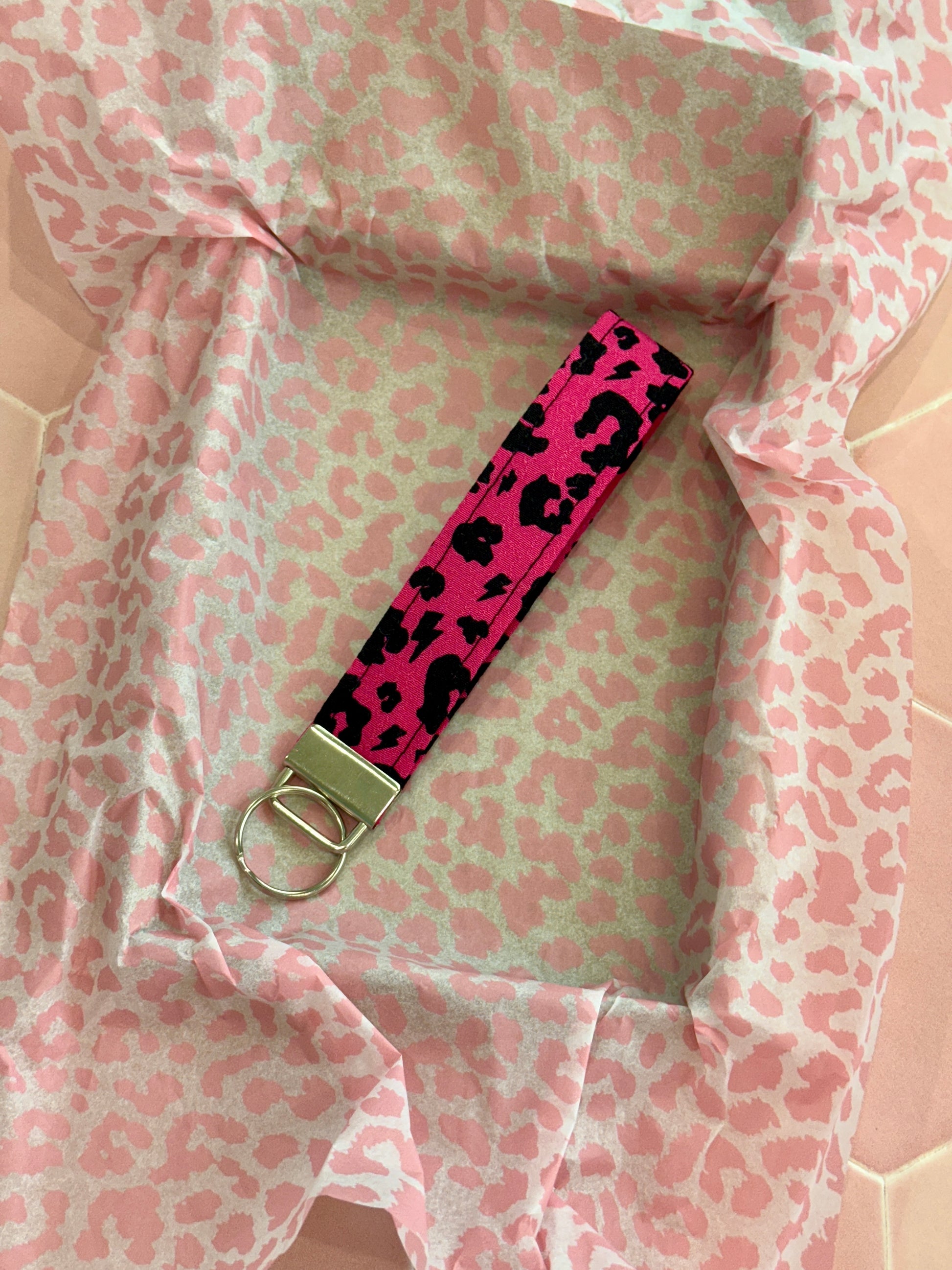 Raspberry Pink Leopard Print Wristlet Keychain in packaging