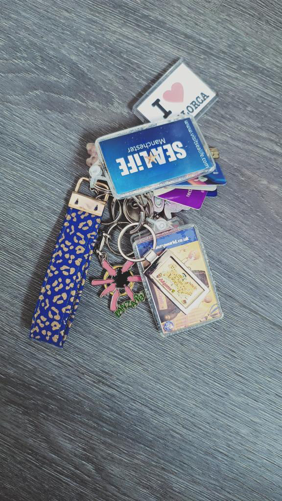 Blue and Gold Wristlet Keychain attached to a set of keys