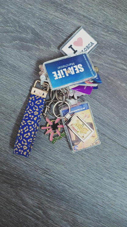 Blue and Gold Wristlet Keychain attached to a set of keys